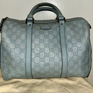 Authentic Gucci Guccissima Joy Boston Bag in light blue.